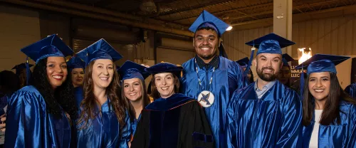 TCC Graduates Pose with TCC President, Dr. Leigh B. Goodson 